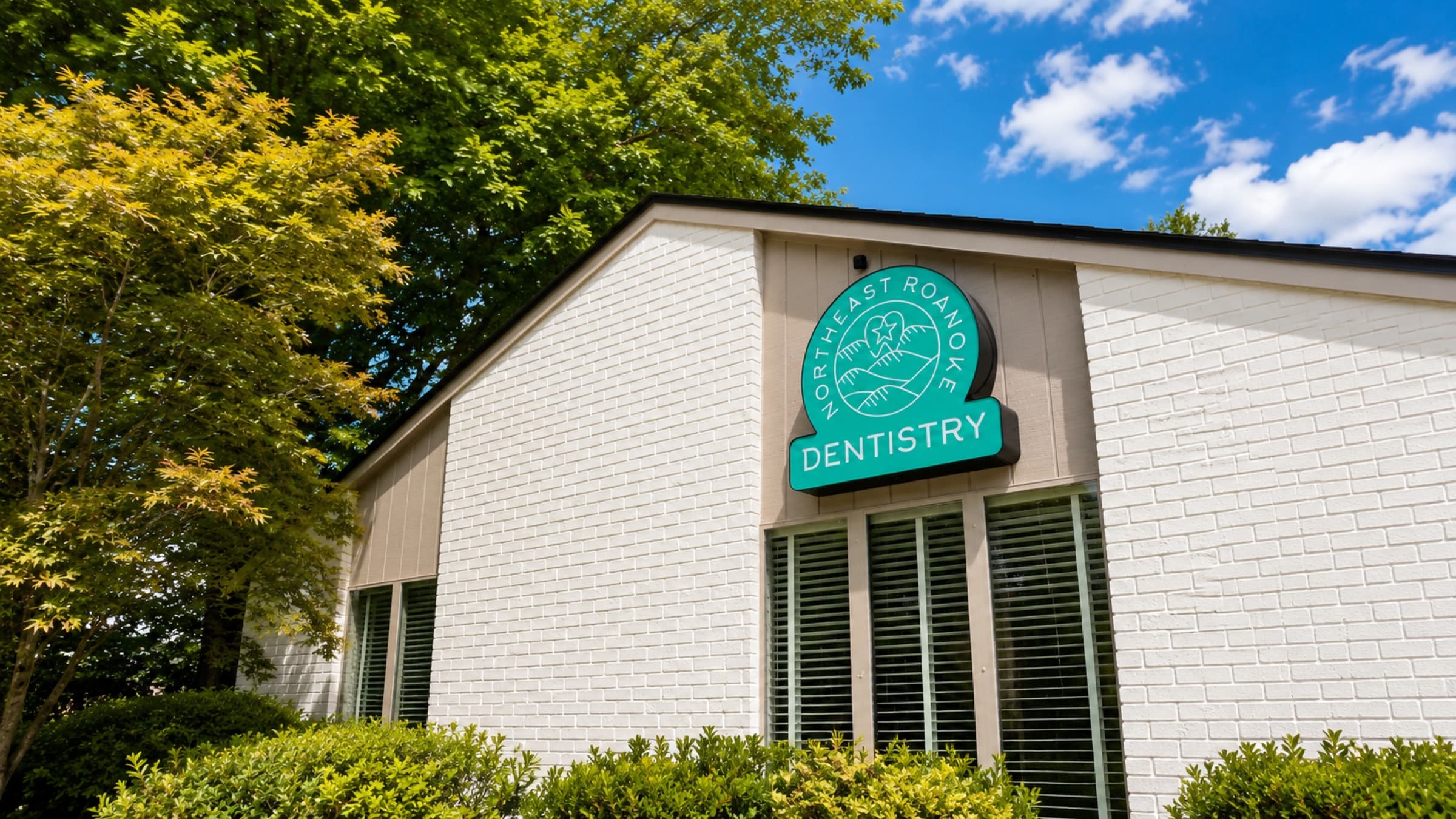 Northeast Roanoke Dentistry exterior on Orange Avenue NE — practice signage above the entrance